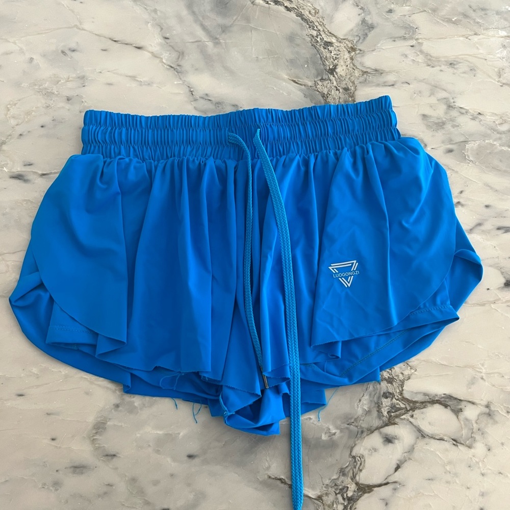 Blue Athletic Shorts. Kiki kona shorts.